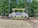 Stone entrance sign for the Firefly Overlook community at Jordan Lake at 410 Firefly Overlook, Pittsboro, NC 27312