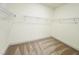 Large walk-in closet with wire shelving and carpeted floor at 117 Ausban Rdg Ln # 034, Four Oaks, NC 27524