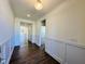 Bright entryway with hardwood floors and wainscoting at 117 Ausban Rdg Ln # 034, Four Oaks, NC 27524