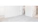 Bright bedroom with neutral carpeting and ensuite bathroom access at 218 Sweetbay Tree Dr, Wendell, NC 27591