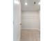 Spacious closet with wire shelving and neutral carpeting at 2023 Seneca Dr # 32, Raleigh, NC 27604