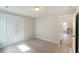 Spacious bedroom with double doors and access to hallway at 2023 Seneca Dr # 32, Raleigh, NC 27604