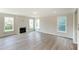 Spacious living room with fireplace and hardwood floors at 2023 Seneca Dr # 32, Raleigh, NC 27604