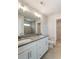 Bathroom with double vanity, large mirror, and a separate shower at 2023 Seneca Dr # 32, Raleigh, NC 27604