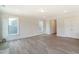 Open living room with hardwood floors and recessed lighting at 2023 Seneca Dr # 32, Raleigh, NC 27604