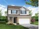 Two-story home with brick and siding exterior at 2023 Seneca Dr # 32, Raleigh, NC 27604