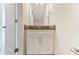Small bathroom with a single vanity, neutral color scheme, and modern fixtures at 2023 Seneca Dr # 32, Raleigh, NC 27604