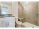 Bathroom with walk-in shower and white vanity at 2023 Seneca Dr # 32, Raleigh, NC 27604