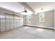 Two-car garage with automatic door and ample storage at 190 Whistlers Cv, Louisburg, NC 27549
