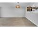 Bright dining room with stylish light fixture at 3915 Swinton St, Raleigh, NC 27616