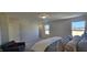 Main bedroom with carpet, large windows, and comfortable seating at 805 Emmer St, Rolesville, NC 27571