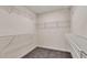 Large walk-in closet with wire shelving providing ample storage at 4413 Gehrig Ln # 19, Raleigh, NC 27616