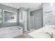 Bathroom boasts double vanity, garden tub, and shower at 221 Southerby Dr, Garner, NC 27529