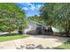 Rear view of home with deck and spacious backyard at 221 Southerby Dr, Garner, NC 27529