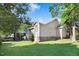 Tan house exterior with deck and access to backyard at 221 Southerby Dr, Garner, NC 27529