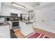 Modern kitchen with stainless steel appliances and granite countertops at 221 Southerby Dr, Garner, NC 27529