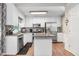 Modern kitchen with stainless steel appliances and island at 221 Southerby Dr, Garner, NC 27529