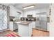 Updated kitchen featuring stainless steel appliances and granite countertops at 221 Southerby Dr, Garner, NC 27529
