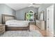 Spacious main bedroom with hardwood floors and large window at 221 Southerby Dr, Garner, NC 27529