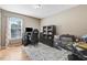 Home office with built-in shelving and hardwood floors at 221 Southerby Dr, Garner, NC 27529