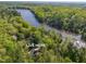 Aerial view of house near a lake at 1817 N Lakeshore Dr, Chapel Hill, NC 27514