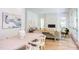 Bright dining area with a light wood table and access to a patio at 1817 N Lakeshore Dr, Chapel Hill, NC 27514