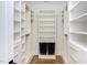 Large walk-in closet with ample shelving and hanging space at 1817 N Lakeshore Dr, Chapel Hill, NC 27514