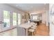 Dining area with view into kitchen and access to backyard at 1817 N Lakeshore Dr, Chapel Hill, NC 27514