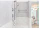 Modern shower with tiled walls and built-in niche at 1817 N Lakeshore Dr, Chapel Hill, NC 27514