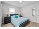Bedroom with a queen bed, nightstands, and ceiling fan at 221 Stroud St, Sanford, NC 27330