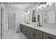 Bathroom with double vanity and neutral tones at 210 Lilliput Ln, Wake Forest, NC 27587