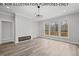 Living room with fireplace and hardwood floors at 210 Lilliput Ln, Wake Forest, NC 27587