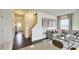 Inviting entryway with hardwood floors and staircase leading upstairs at 401 Shorthorn Dr, Wake Forest, NC 27587