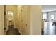 Modern kitchen with white cabinets, granite countertops, and stainless steel appliances at 401 Shorthorn Dr, Wake Forest, NC 27587