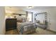 Bedroom with full bed, dresser, and industrial clothing rack at 401 Shorthorn Dr, Wake Forest, NC 27587