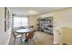 Spacious bonus room with seating area and built-in shelving at 401 Shorthorn Dr, Wake Forest, NC 27587