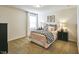 Bedroom with queen bed, nightstands, and window at 401 Shorthorn Dr, Wake Forest, NC 27587
