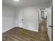 Bedroom with two doors and a view of the kitchen at 825 Chalmers St, Durham, NC 27707