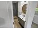Modern bathroom with dark tile shower and floating vanity at 825 Chalmers St, Durham, NC 27707