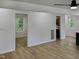 Open hallway view of bedrooms and a bathroom at 825 Chalmers St, Durham, NC 27707