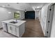 Open concept kitchen with island and living area view at 825 Chalmers St, Durham, NC 27707