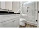 Modern bathroom with marble shower and dark countertop at 112 Lambert Ln, Fuquay Varina, NC 27526