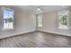 Spacious bedroom with hardwood floors and ample natural light at 112 Lambert Ln, Fuquay Varina, NC 27526