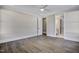 Bright bedroom with hardwood floors and access to bathroom at 112 Lambert Ln, Fuquay Varina, NC 27526