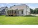 Two-story home with screened porch and attached garage at 112 Lambert Ln, Fuquay Varina, NC 27526