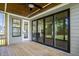 Screened porch with sliding glass doors leading to backyard at 112 Lambert Ln, Fuquay Varina, NC 27526