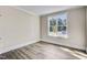 Bright and airy office with large windows and hardwood floors at 112 Lambert Ln, Fuquay Varina, NC 27526