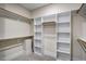 Spacious walk-in closet with ample shelving and hanging space at 112 Lambert Ln, Fuquay Varina, NC 27526