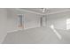 Empty bedroom with carpeted floors and two doorways at 535 Husketh Rd, Youngsville, NC 27596