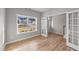 Bright home office with wood floors and French doors at 535 Husketh Rd, Youngsville, NC 27596